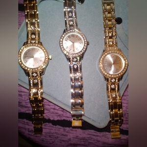 Vintage "FMD" Women's Silver Toned Rhinestone Embellished Stainless Quartz Watch
